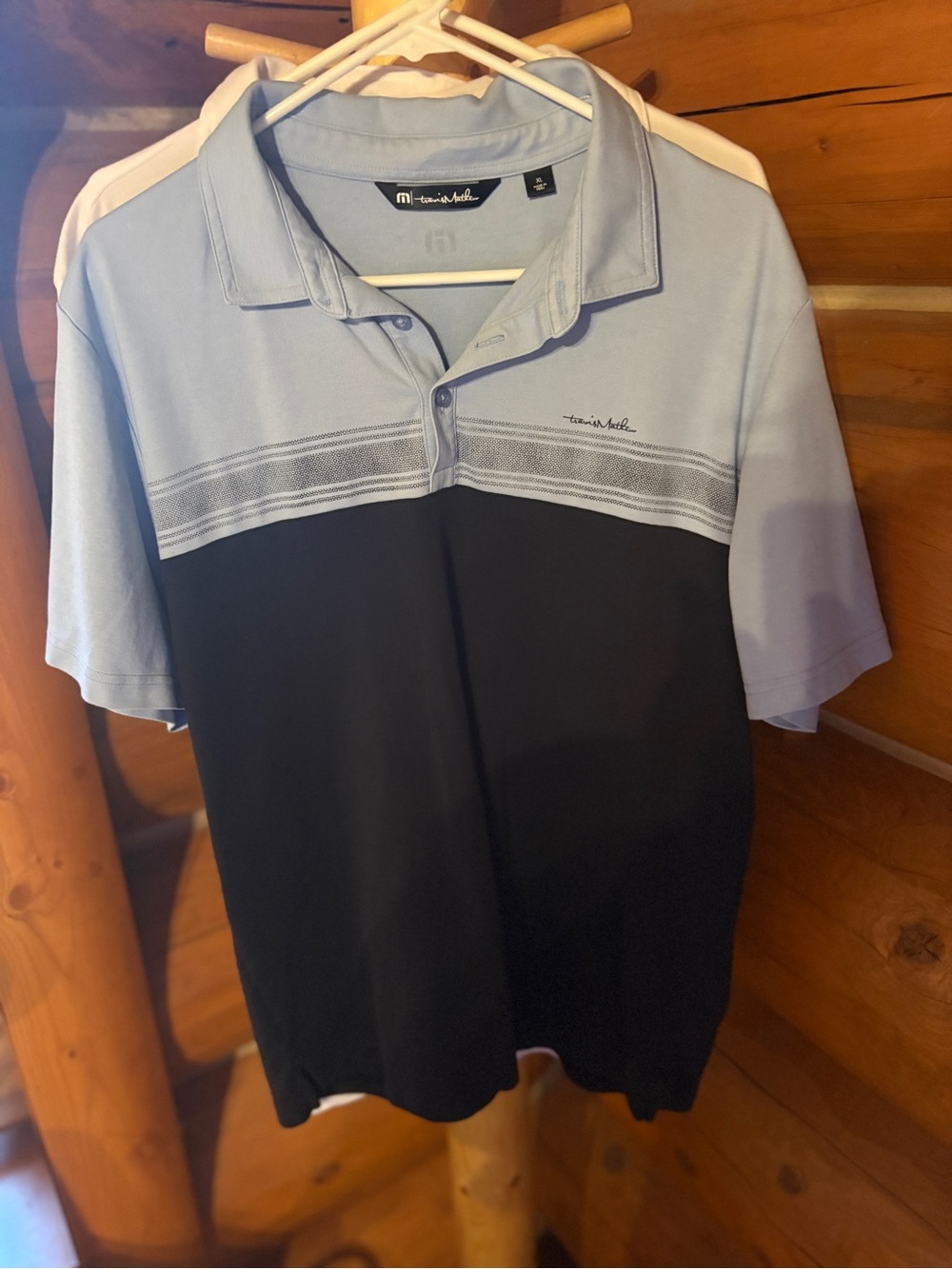 Travis Mathew’s gold polo